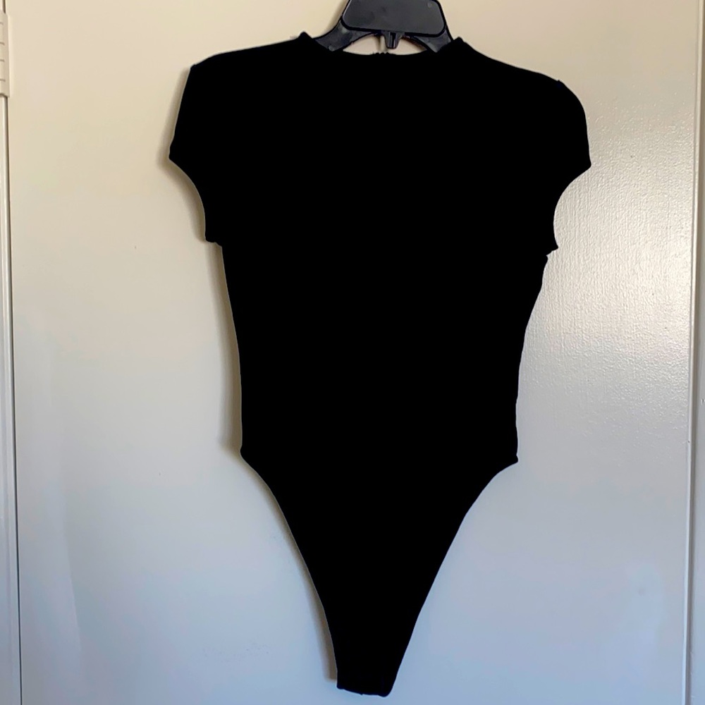 Never worn black high neck body suit